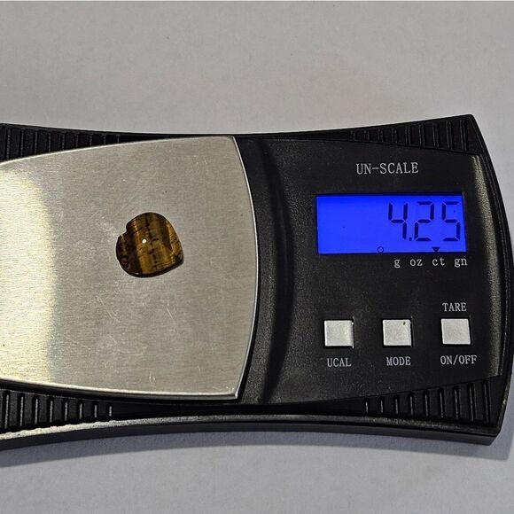 Tiger Eye, cut and faceted into a ❤️ shape. Great for wire wrapping. - Picture 2 of 4